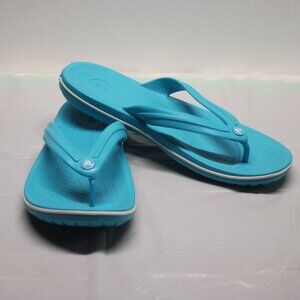 MENS CROCS FLIP FLOPS - 11 MENS OR 12 1/2 WOMENS